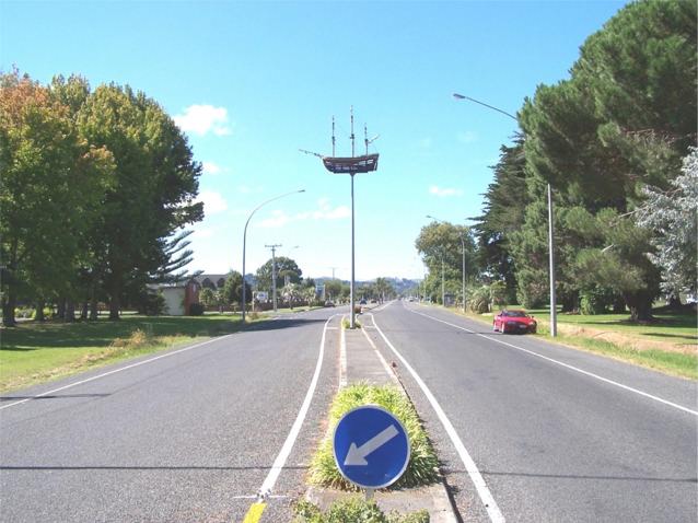 Gladstone Road at the entrance to Gisborne showing model ship
